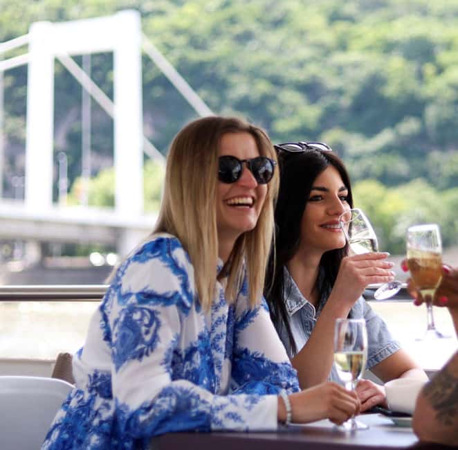 Budapest: 60-Minute Panoramic Cruise with Drink included - The onboard vibe: party songs, attentive staff, and quick service