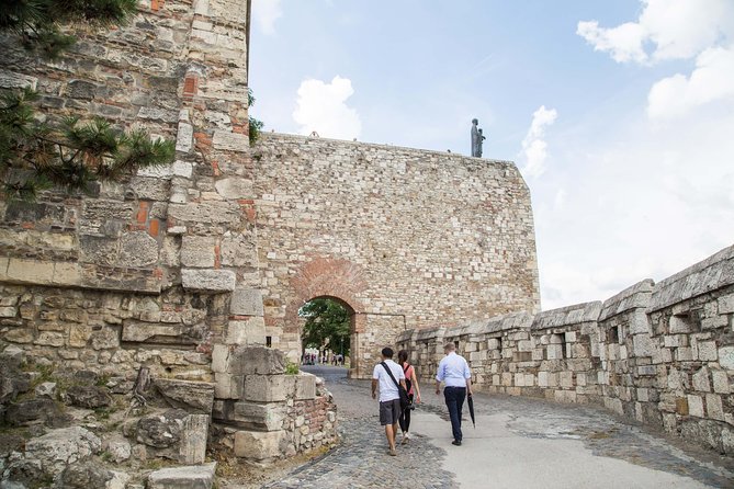Budapest Castle Walk - Matthias Church: the coronation site, the tiled roof, and the WWII scars
