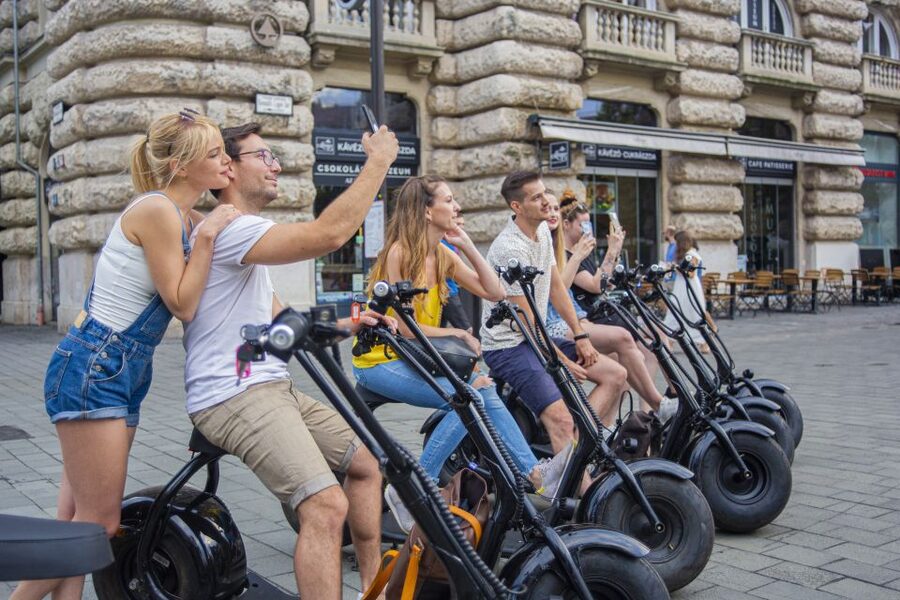 Budapest: Guided City Sights Tour by E-Scooter - Pest side must-sees: Basilica, Liberty Square, and Parliament in motion