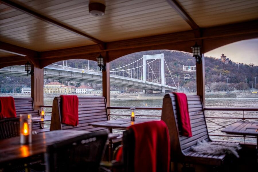 Budapest: Historic Cruise with Welcome Drink - Gellért Baths and Hotel Gellért: A Contrast in Riverfront Personality