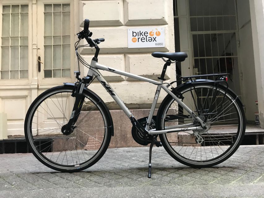 Budapest: Historic Downtown Bicycle Ride with Scenic Views - Finishing back near the Jewish Quarter, with Market Hall and the National Museum