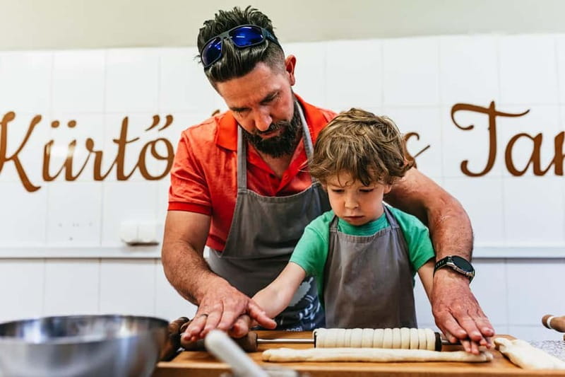 Budapest: Hungarian Chimney Cake Workshop in the City Center - The Hosts and the English Instruction That Make It Work