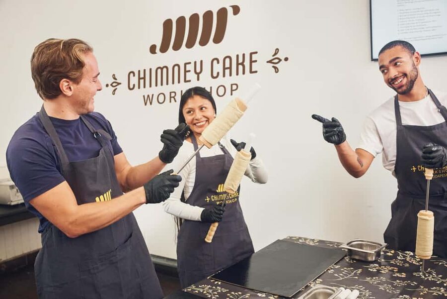 Budapest: Traditional Chimney Cake (Kürtőskalács) Workshop - Rolling, wrapping, and baking on the rotating grill
