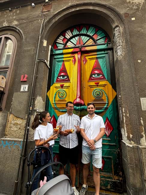 Budapest: Walking Tour with Chimney Cake & Polaroid Photos - Street art murals on Budapest firewall walls