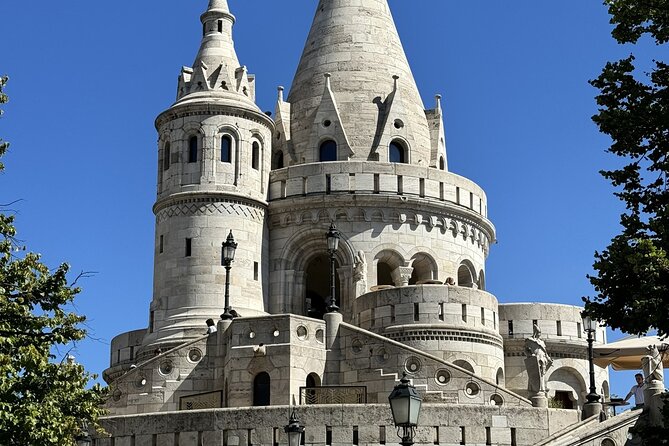 Gems of the Budapest Castle District Walking Tour - Stop 4: Pope Innocent XI area, kings, scholars, and a clue to age