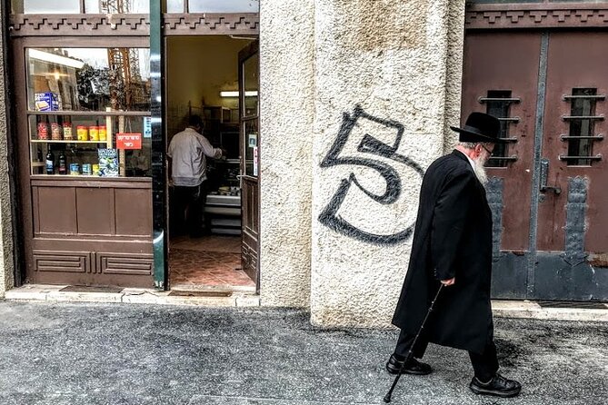 PRIVATE GUIDED Budapest Jewish Heritage walking Tour - Stop 1: Ghetto Memorial Wall, the holes that force you to look