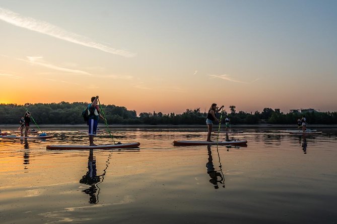 SUP Budapest: Sunset tour - Views worth the paddle: Parliament lighting, Margaret Island, and bridge drama