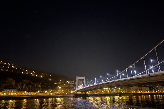 The Bright Lights of Budapest - Private Walking Tour with Boat Cruise & Drink - Széchenyi Chain Bridge at night: where your photos get their real drama